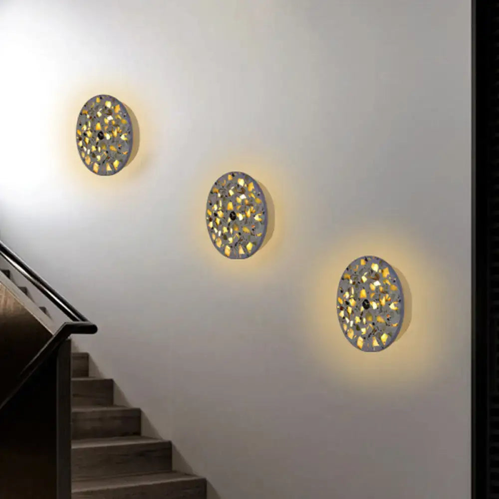 Terrazzo LED wall light trio with gray mosaic discs and warm glow on Tampa Home & Garden Store