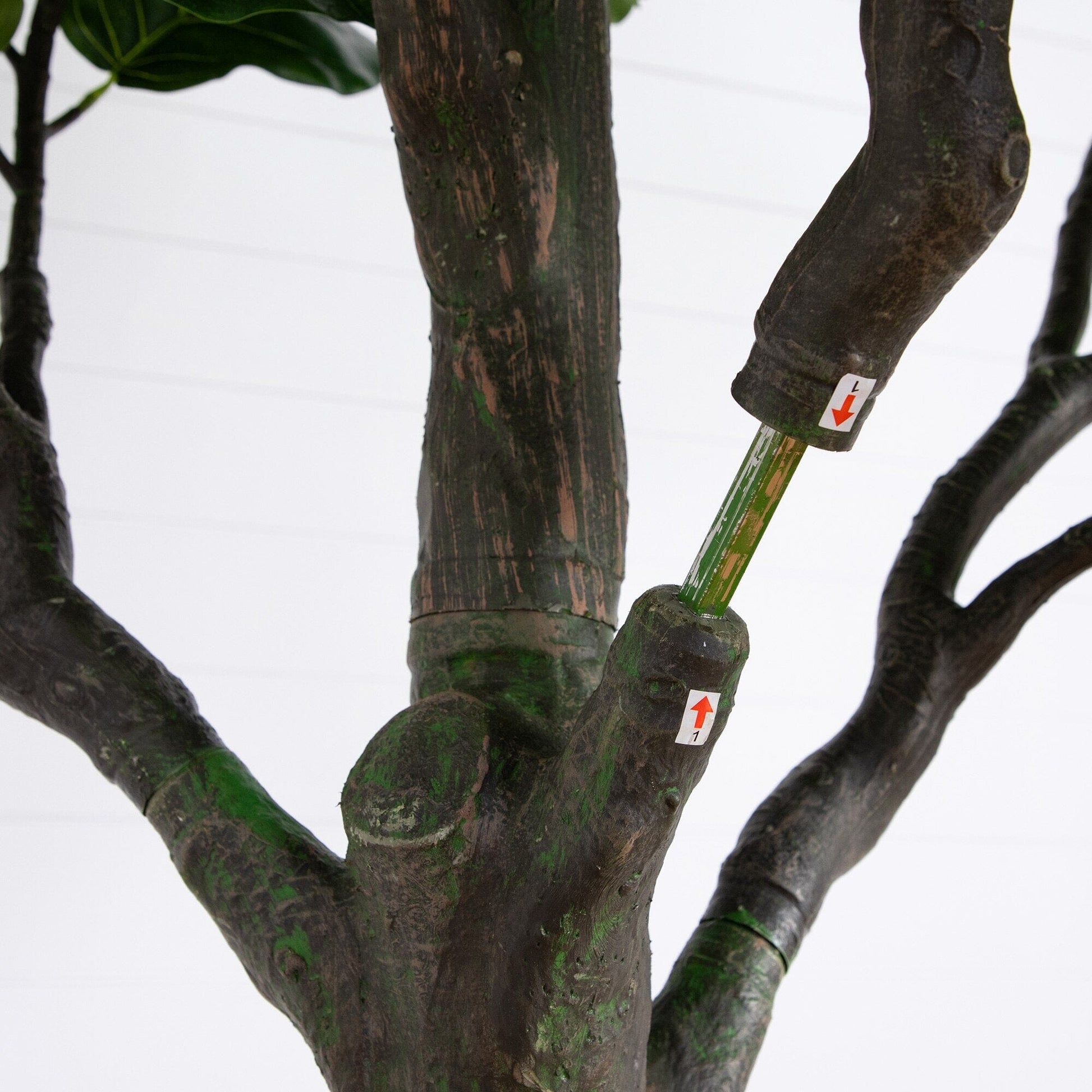 12’ Artificial Fiddle Leaf Tree by Nearly Natural with a textured brown trunk and green moss on Tampa Home & Garden Store