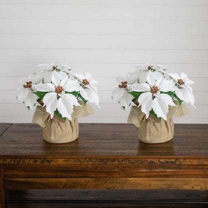 Set of 2 13-inch artificial poinsettia arrangements in burlap planters with white blooms on Tampa Home & Garden Store