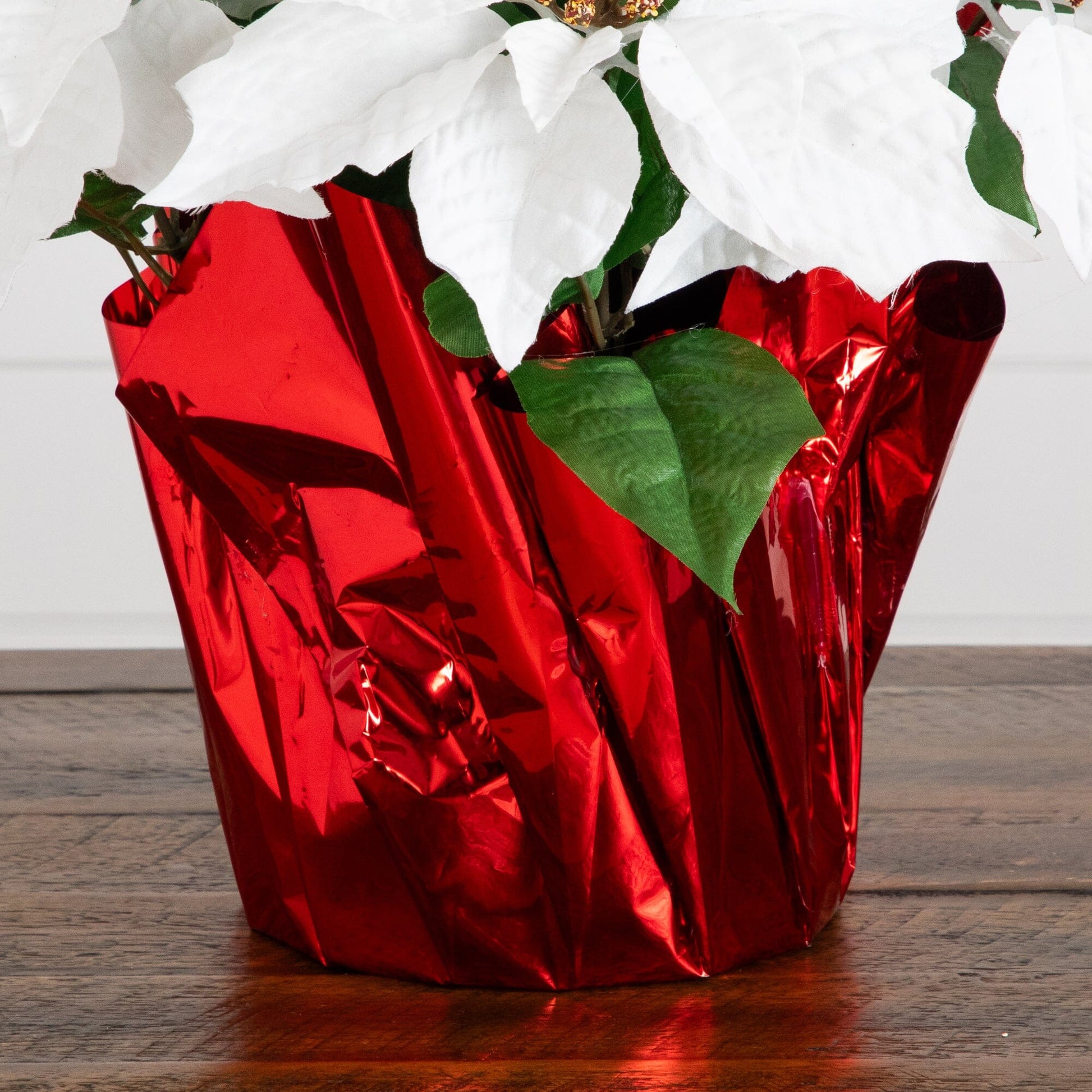 13-inch artificial poinsettia arrangement in a red foil-wrapped planter with white bracts and green leaves set of 2 on Tampa Home & Garden Store