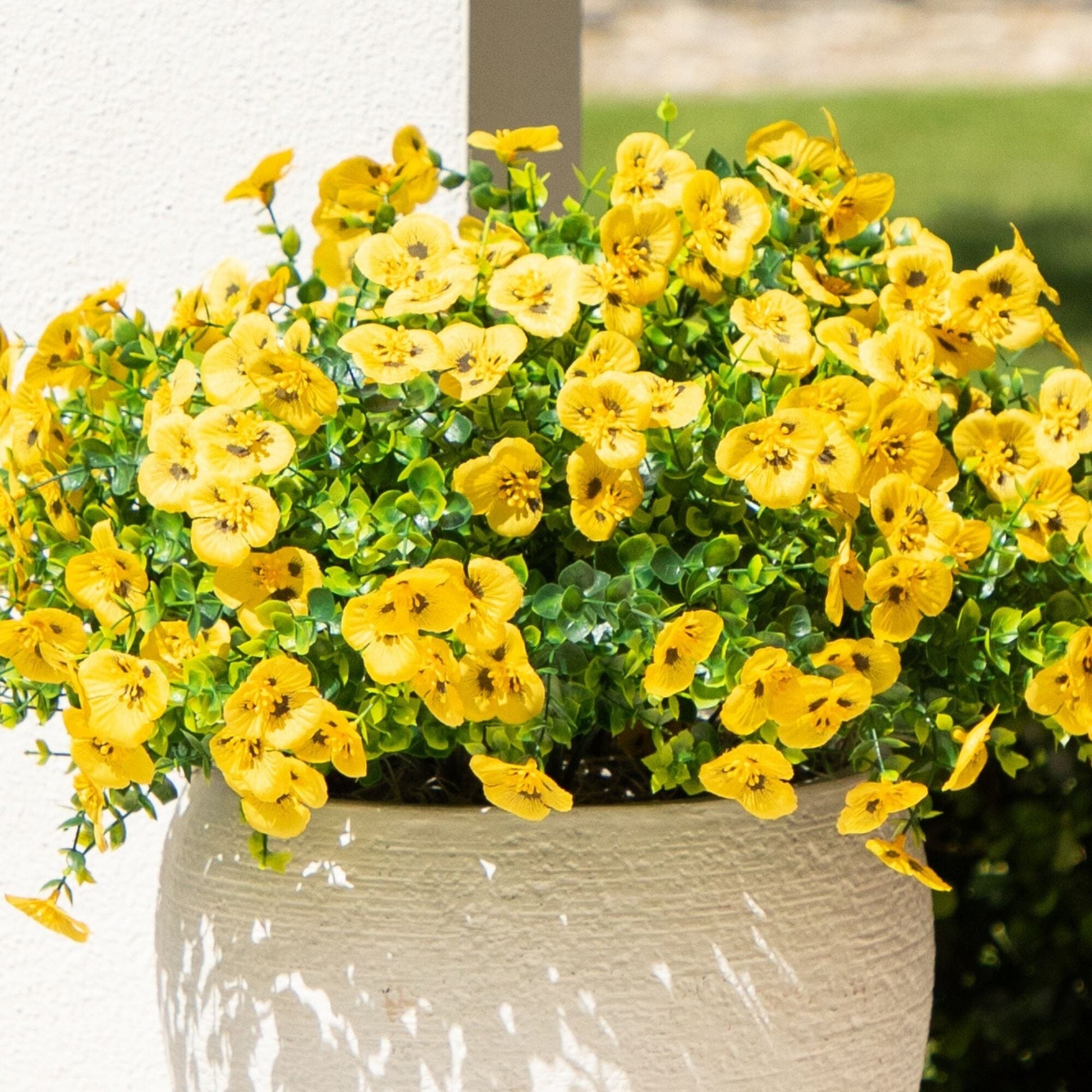 Nearly Natural 13in UV-Resistant Pansy Bush of 12 with yellow blooms and green leaves in planter on Tampa Home & Garden Store