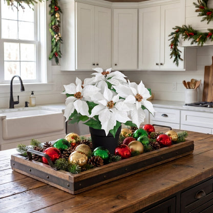 15-inch Nearly Natural poinsettia plant in black pot with white blooms on kitchen island on Tampa Home & Garden Store