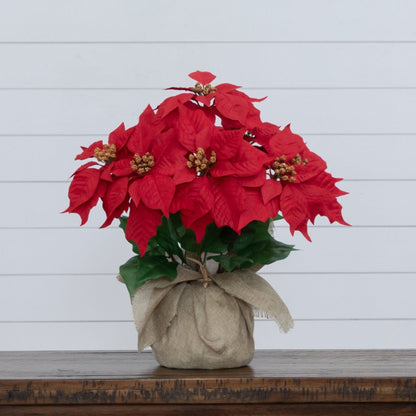 16-inch artificial poinsettia arrangement in burlap planter with red blooms and gold centers on Tampa Home & Garden Store