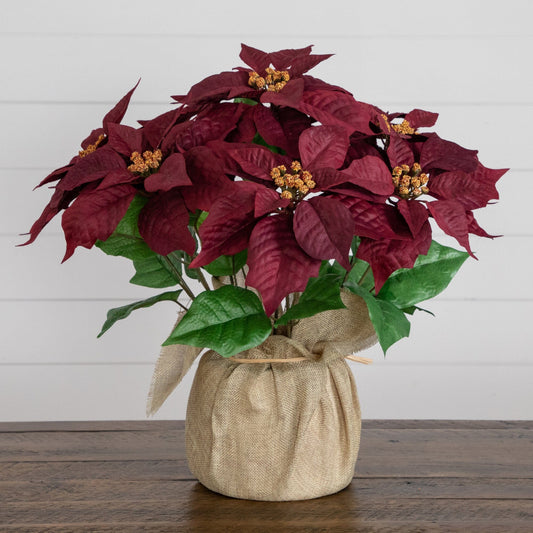 16-inch artificial poinsettia arrangement in burlap planter with red bracts and green leaves Nearly Natural on Tampa Home & Garden Store