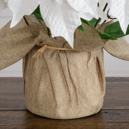 16in artificial poinsettia arrangement in burlap planter with white blooms and green leaves on Tampa Home & Garden Store