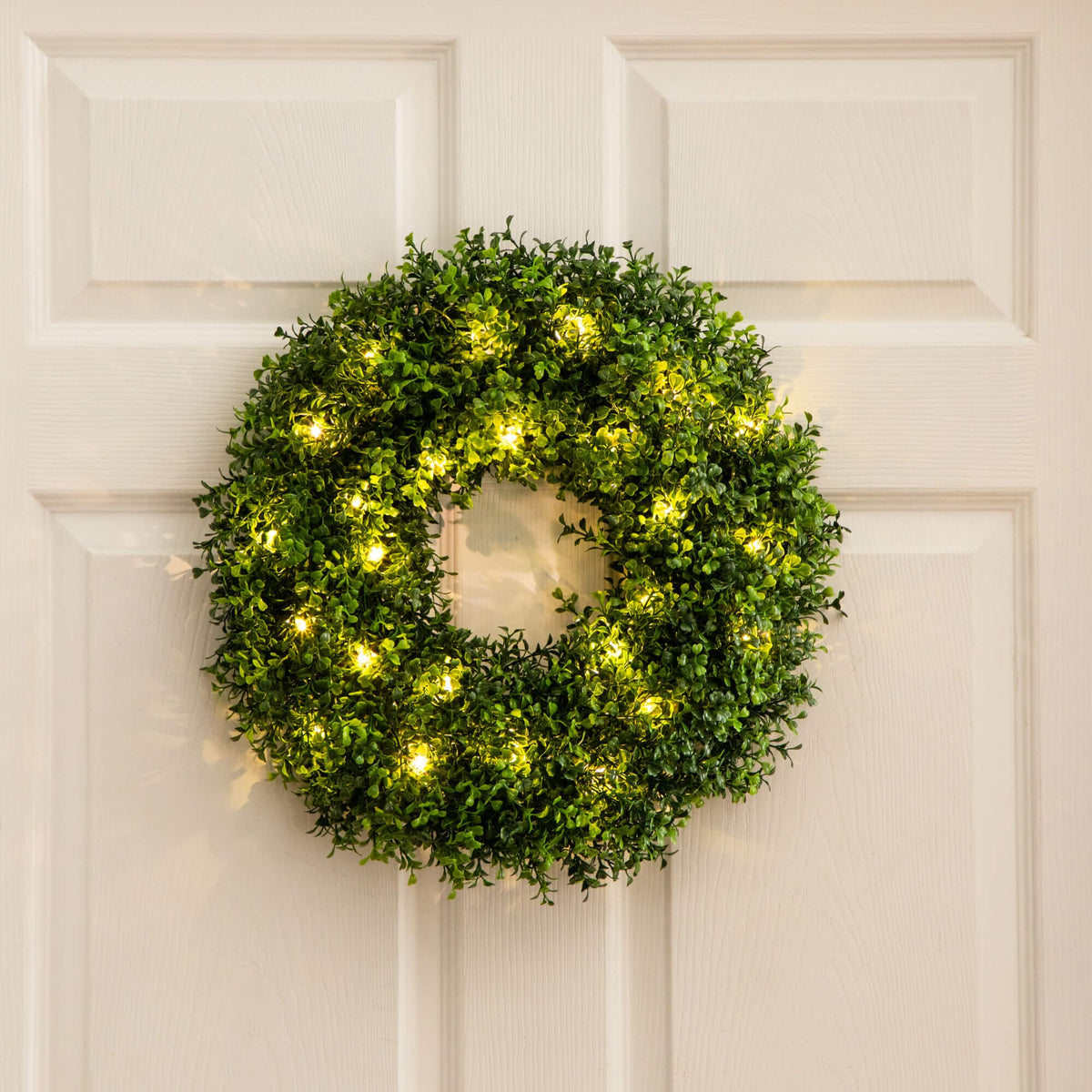 18in pre-lit artificial boxwood wreath with 25 warm white LED lights by Nearly Natural on Tampa Home & Garden Store