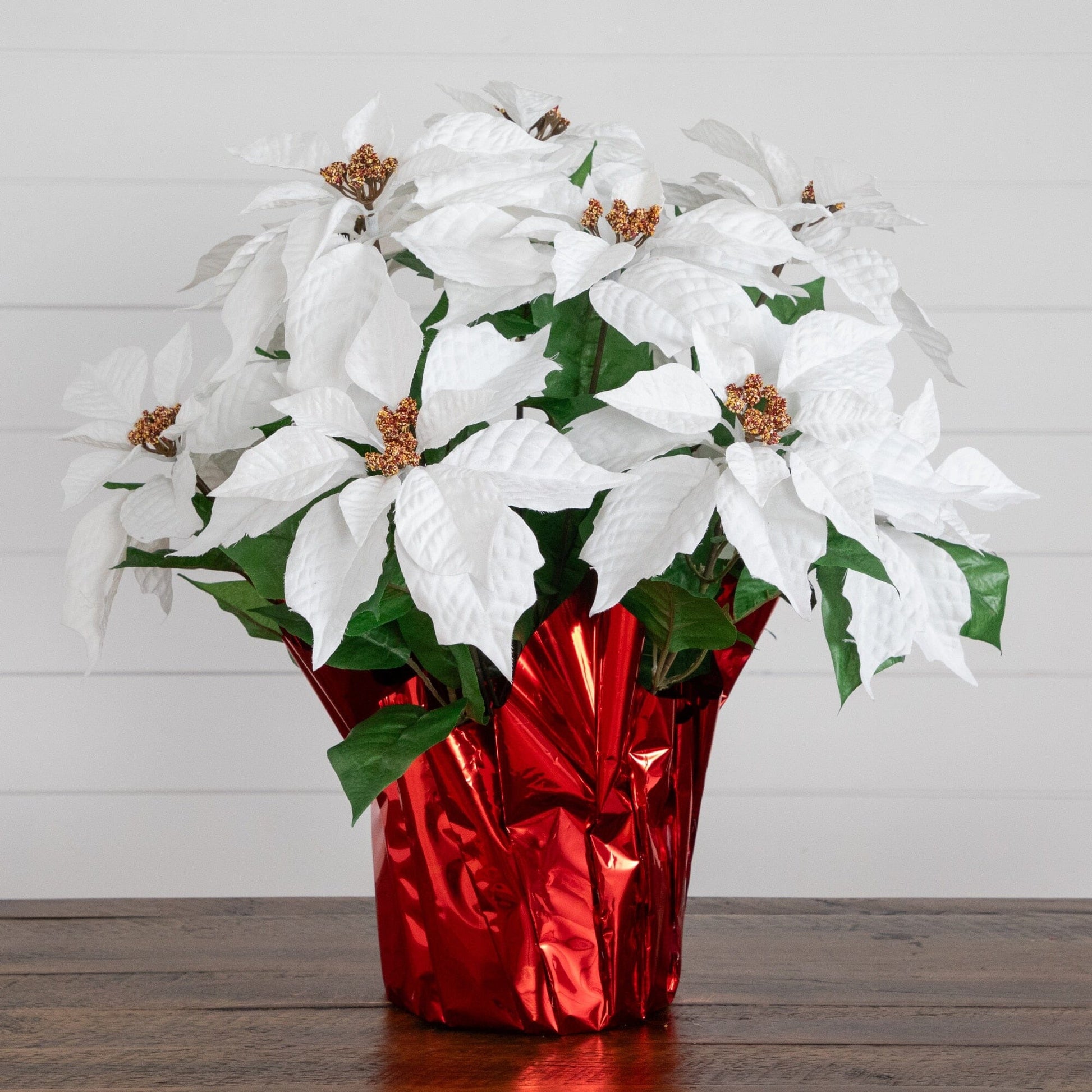 19” artificial lush white poinsettia arrangement in red wrapped planter by Nearly Natural on Tampa Home & Garden Store