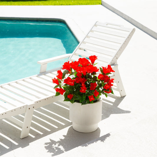 Artificial hibiscus bush with red blooms in a white planter by poolside UV resistant on Tampa Home & Garden Store