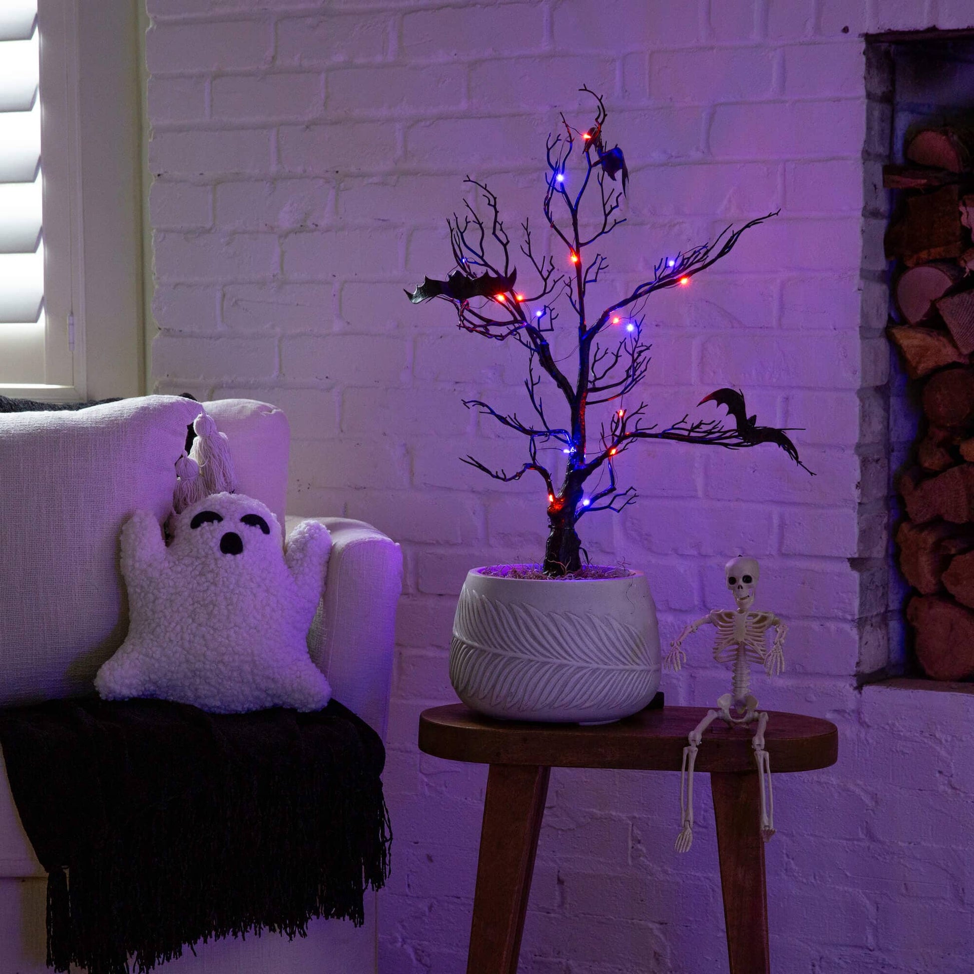 Nearly Natural 2ft Black Spooky Twig Tree with bats and 40 orange & purple LEDs in a white pot on Tampa Home & Garden Store