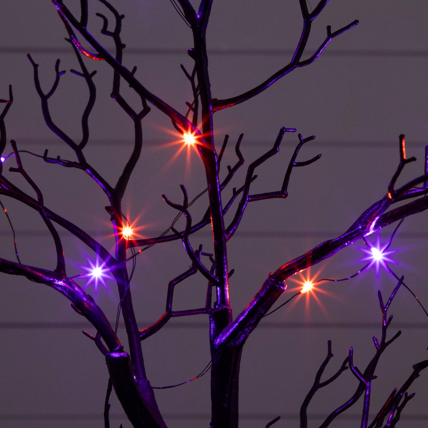 Nearly Natural 2' pre-lit Halloween black spooky twig tree with orange and purple LED lights on Tampa Home & Garden Store