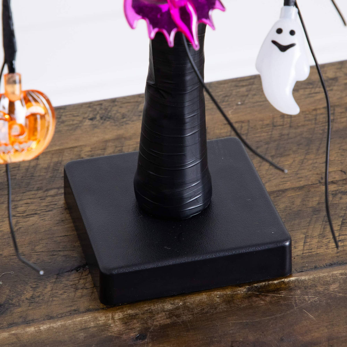 2' Nearly Natural pre-lit Halloween ornament tree with ghost and pumpkin accents on black base on Tampa Home & Garden Store