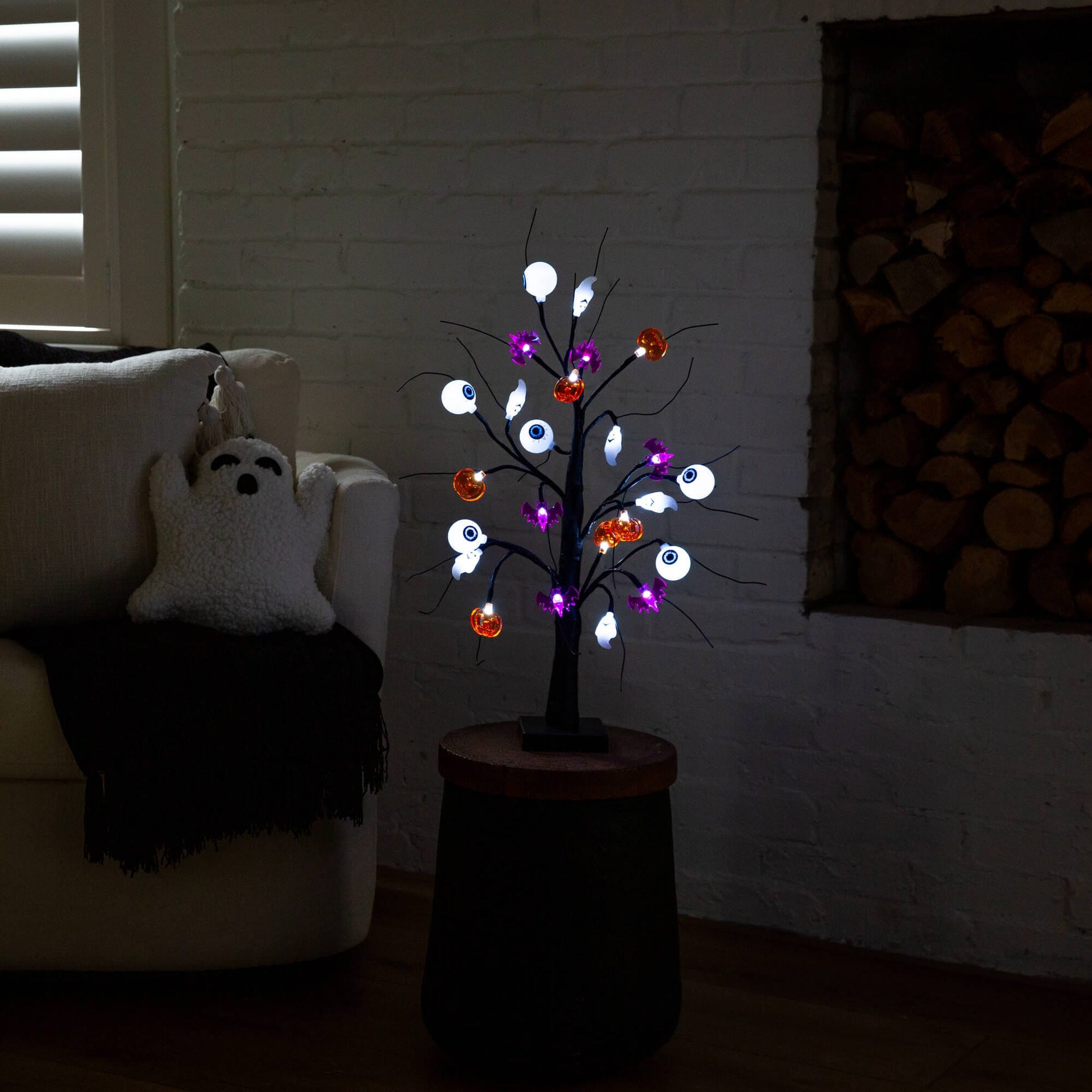 2 ft pre-lit Halloween LED tree with eyeballs, ghosts and pumpkins on black twig branches on Tampa Home & Garden Store