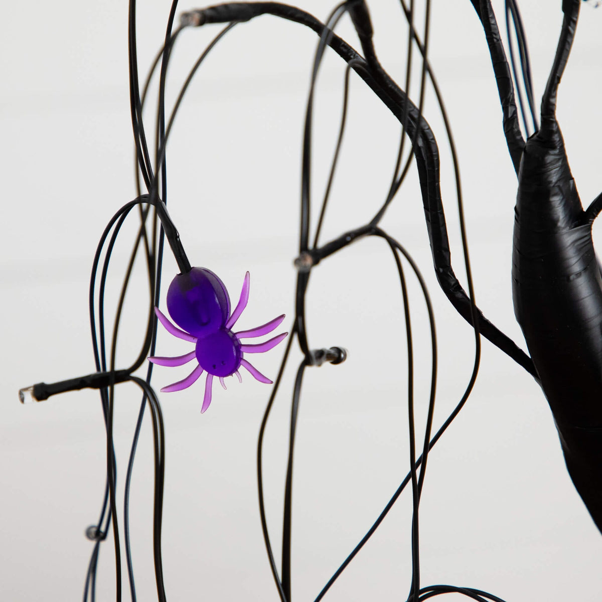 2' Pre-Lit Halloween Spider Tree with purple spider and black wires, 60 LED lights on Tampa Home & Garden Store