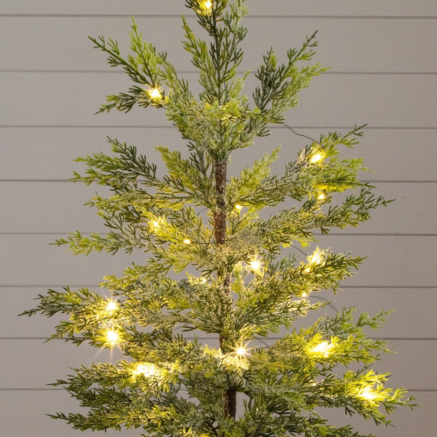 2ft Nearly Natural snowed Cypress Christmas tree with 30 LED lights in a hyacinth basket on Tampa Home & Garden Store