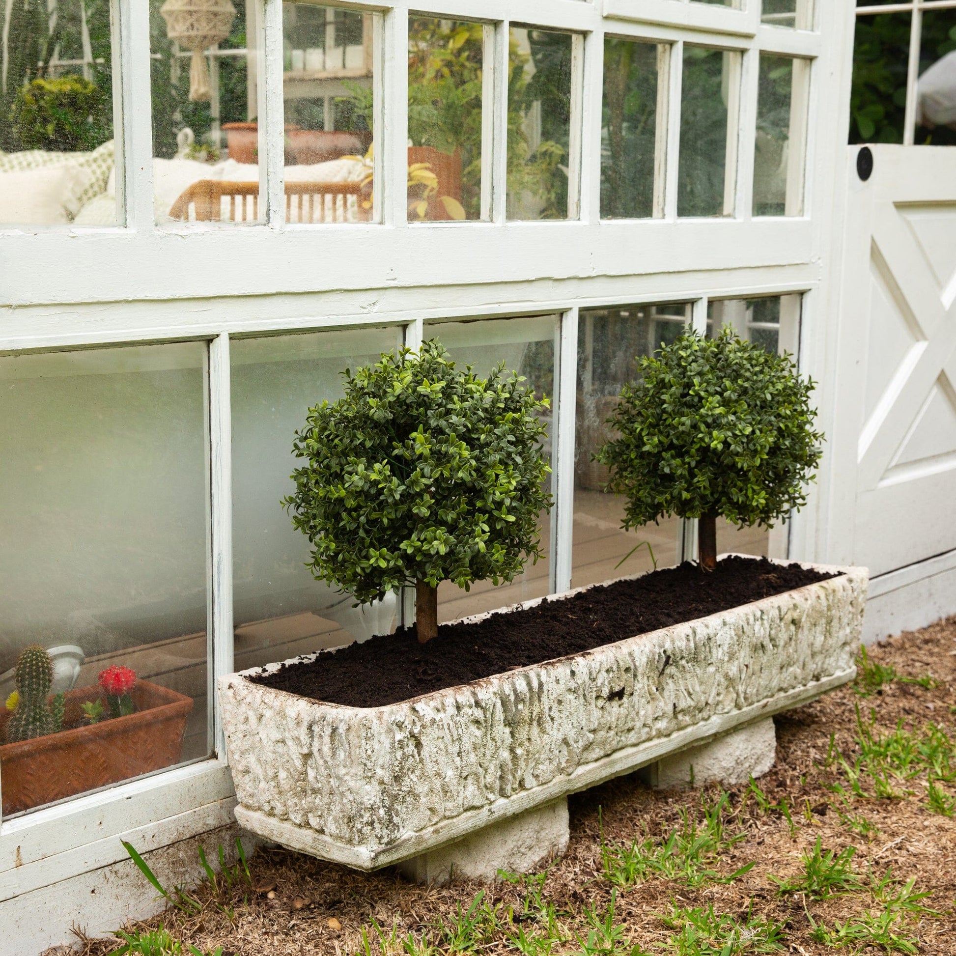 Boxwood topiary pair by Nearly Natural, 2' tall, UV resistant, with ground stake in stone planter on Tampa Home & Garden Store
