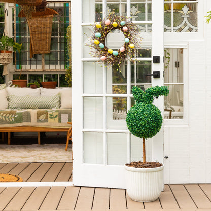 2' UV-resistant artificial Easter boxwood topiary on ground stake set of 2 beside a paneled door on Tampa Home & Garden Store