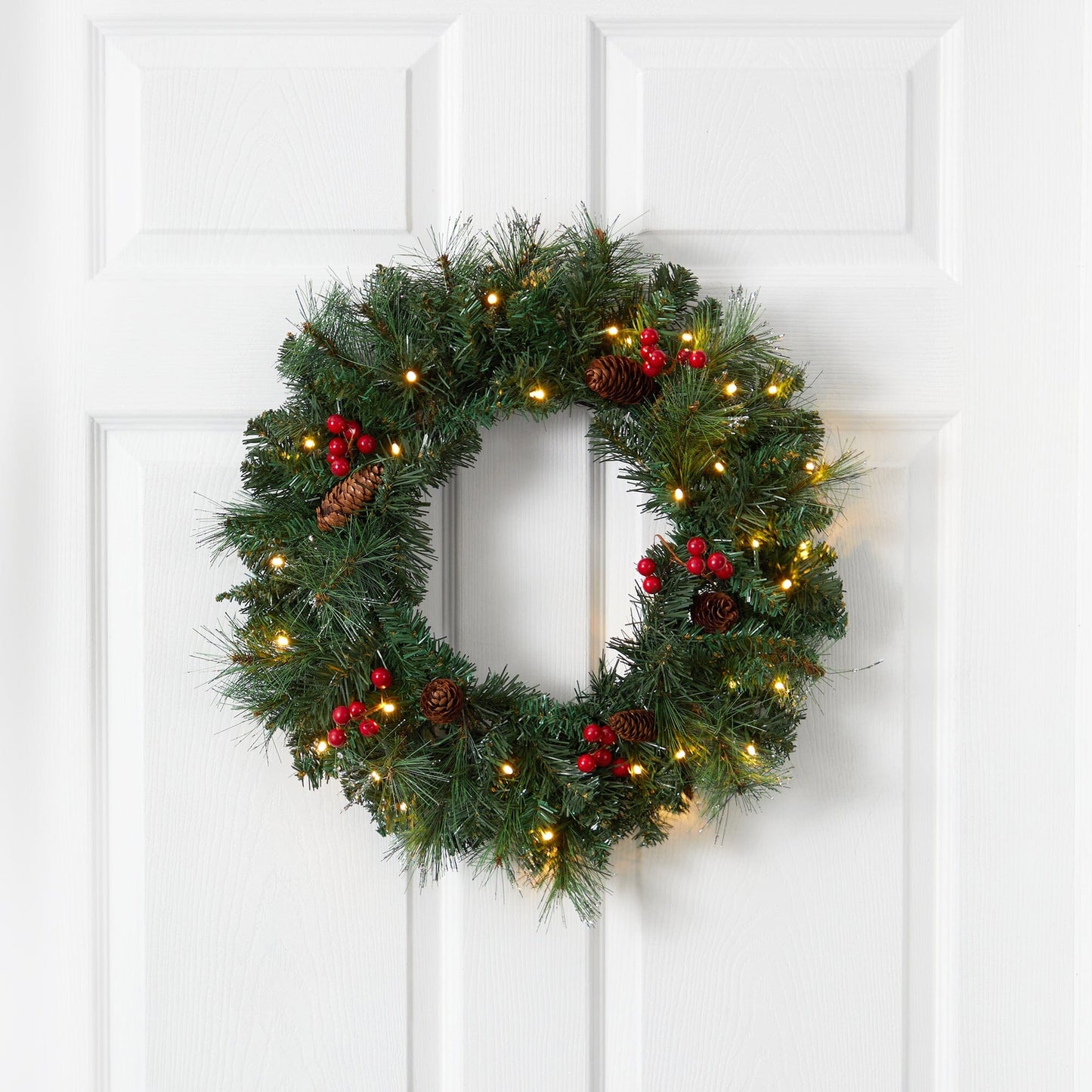 Wreath, 20-inch frosted pine with pinecones, red berries and 35 warm white LED lights on Tampa Home & Garden Store