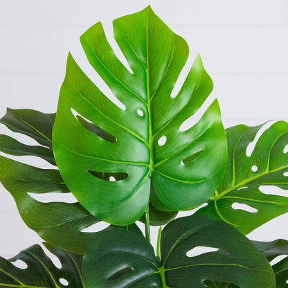 Nearly Natural 20in artificial Swiss Monstera plant in planter with green split leaves on Tampa Home & Garden Store
