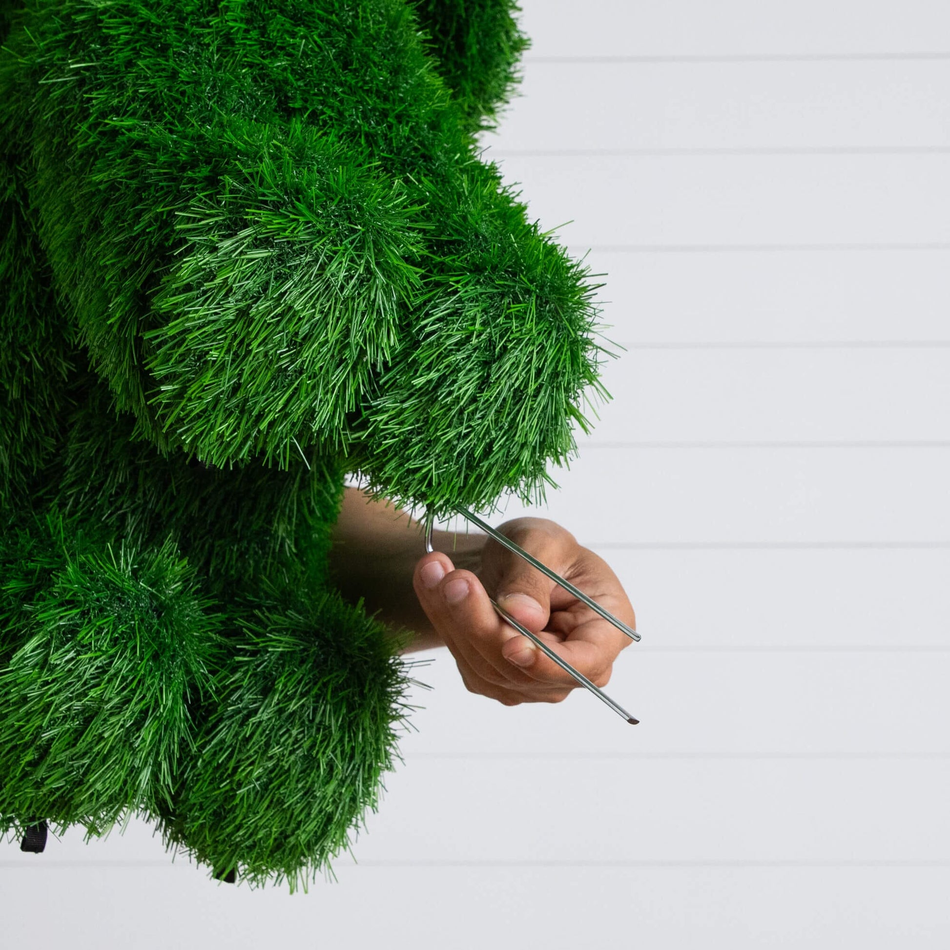 Puppy dog topiary crafted from UV-resistant artificial grass in green for indoor outdoor use on Tampa Home & Garden Store