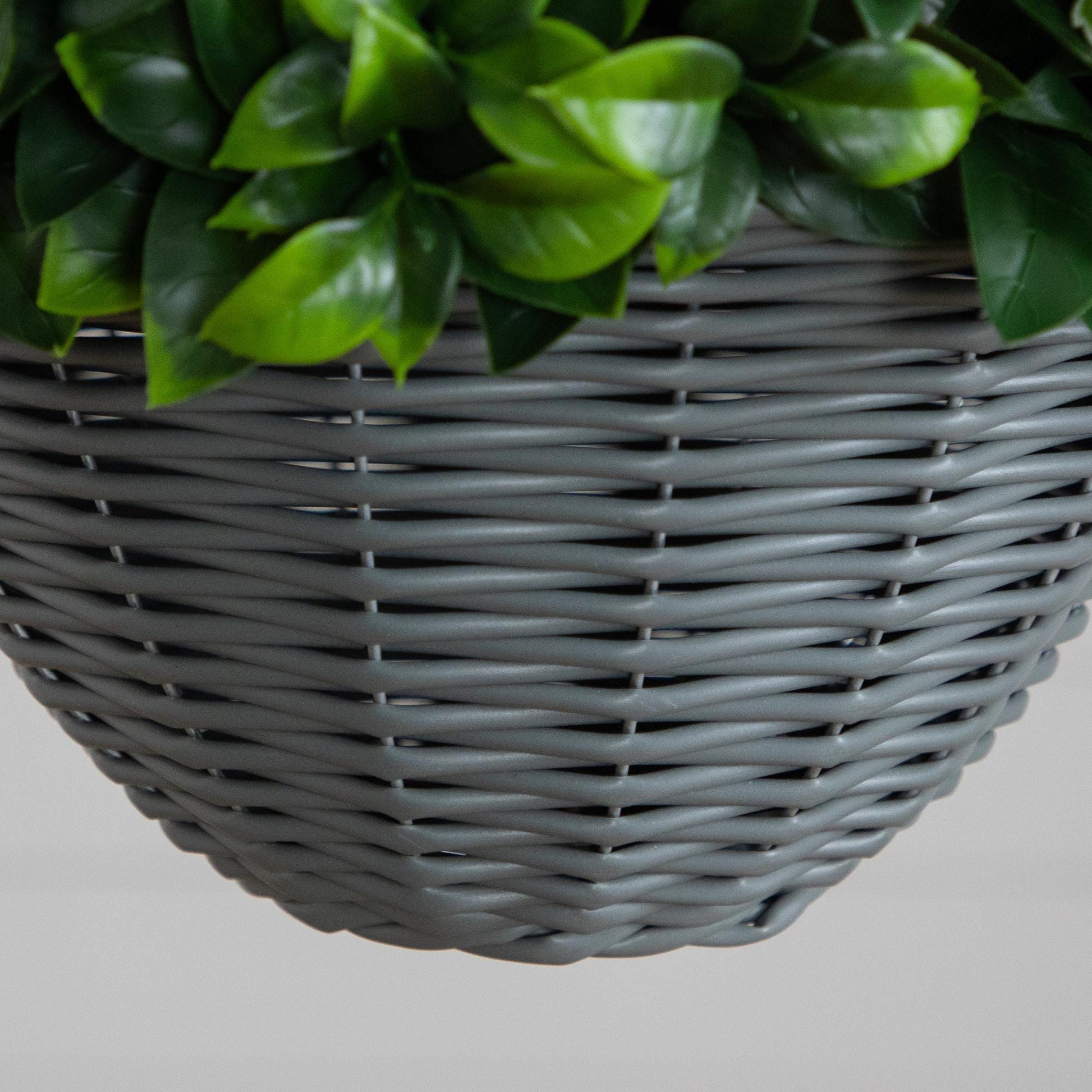 Artificial mini gardenia hanging basket with green leaves in a gray woven basket on Tampa Home & Garden Store