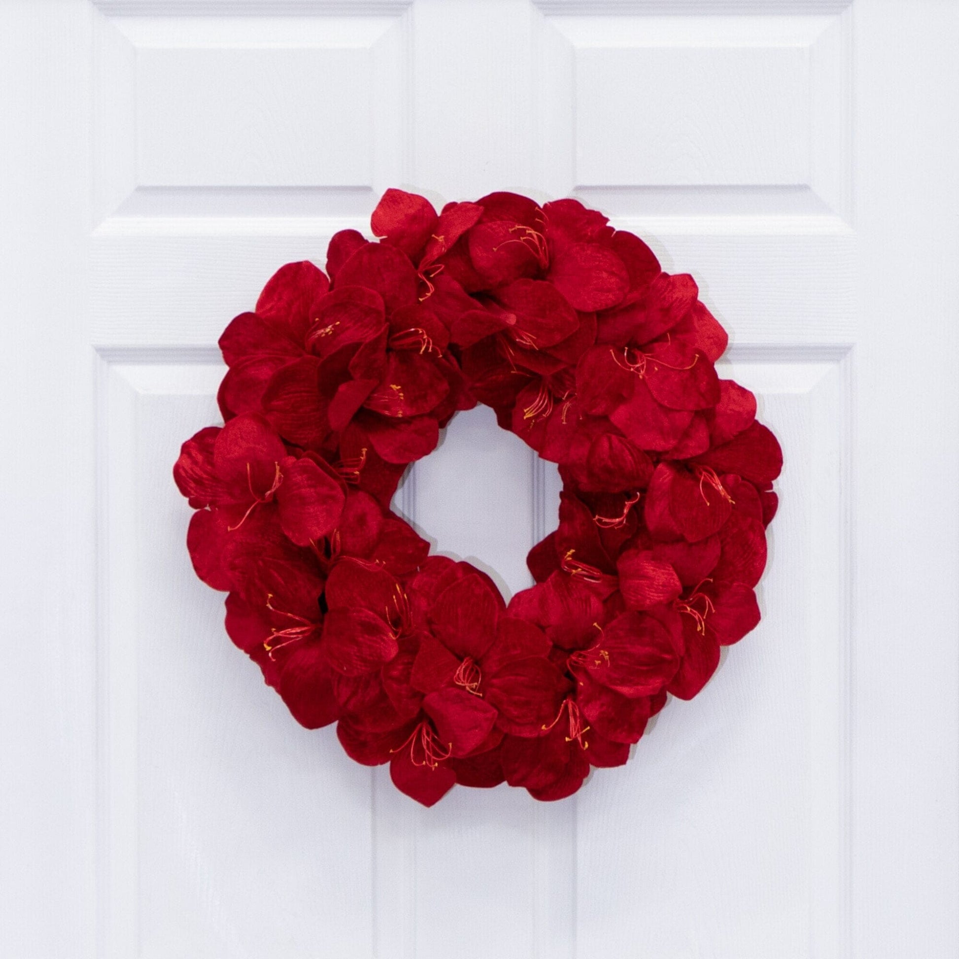 Wreath 22in artificial amaryllis red blooms Nearly Natural on white door on Tampa Home & Garden Store
