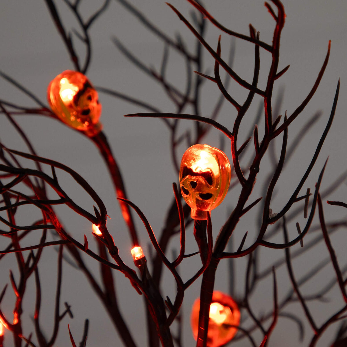 Tree Nearly Natural 22-inch brown twig Halloween pre-lit with 12 orange LED pumpkin lights on Tampa Home & Garden Store