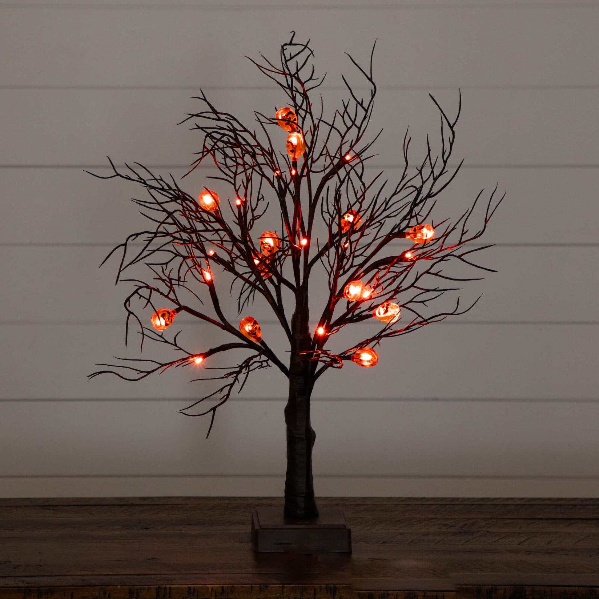 22in Nearly Natural pre-lit Halloween brown twig tree with 12 orange LED pumpkin lights on base on Tampa Home & Garden Store