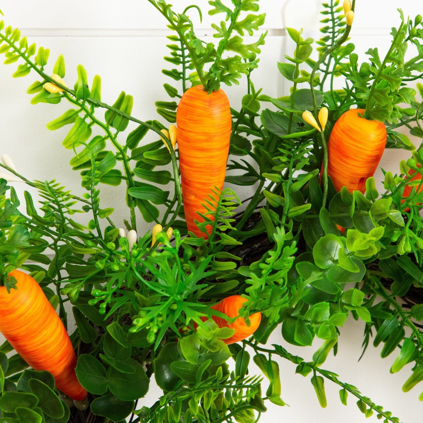 22 inch artificial Easter fern and carrot wreath with orange carrots and green foliage on Tampa Home & Garden Store