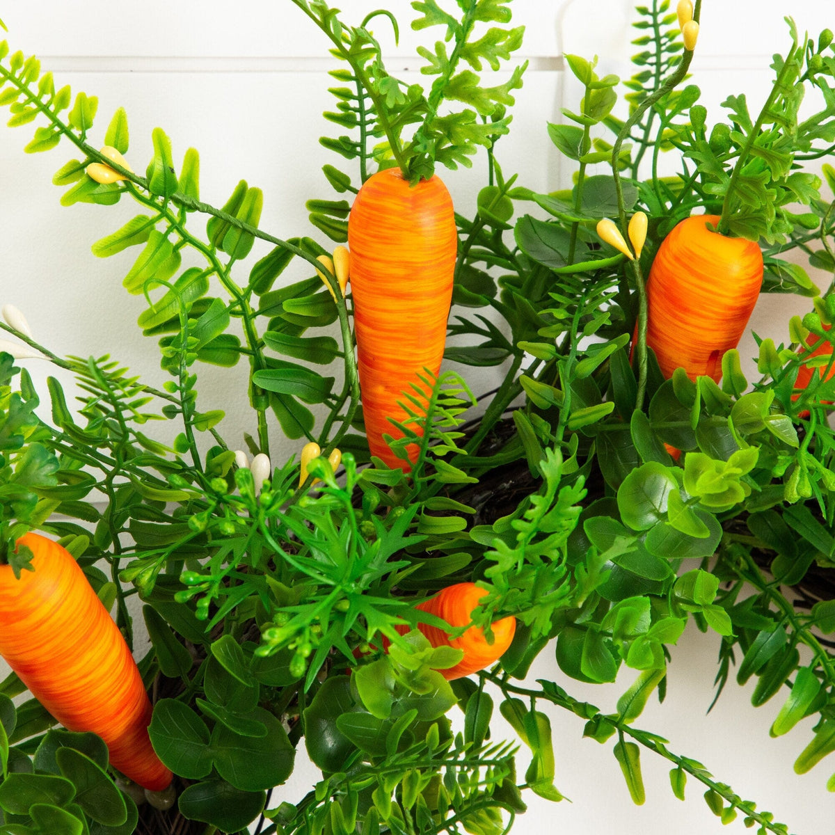 22 inch artificial Easter fern and carrot wreath with orange carrots and green foliage on Tampa Home & Garden Store