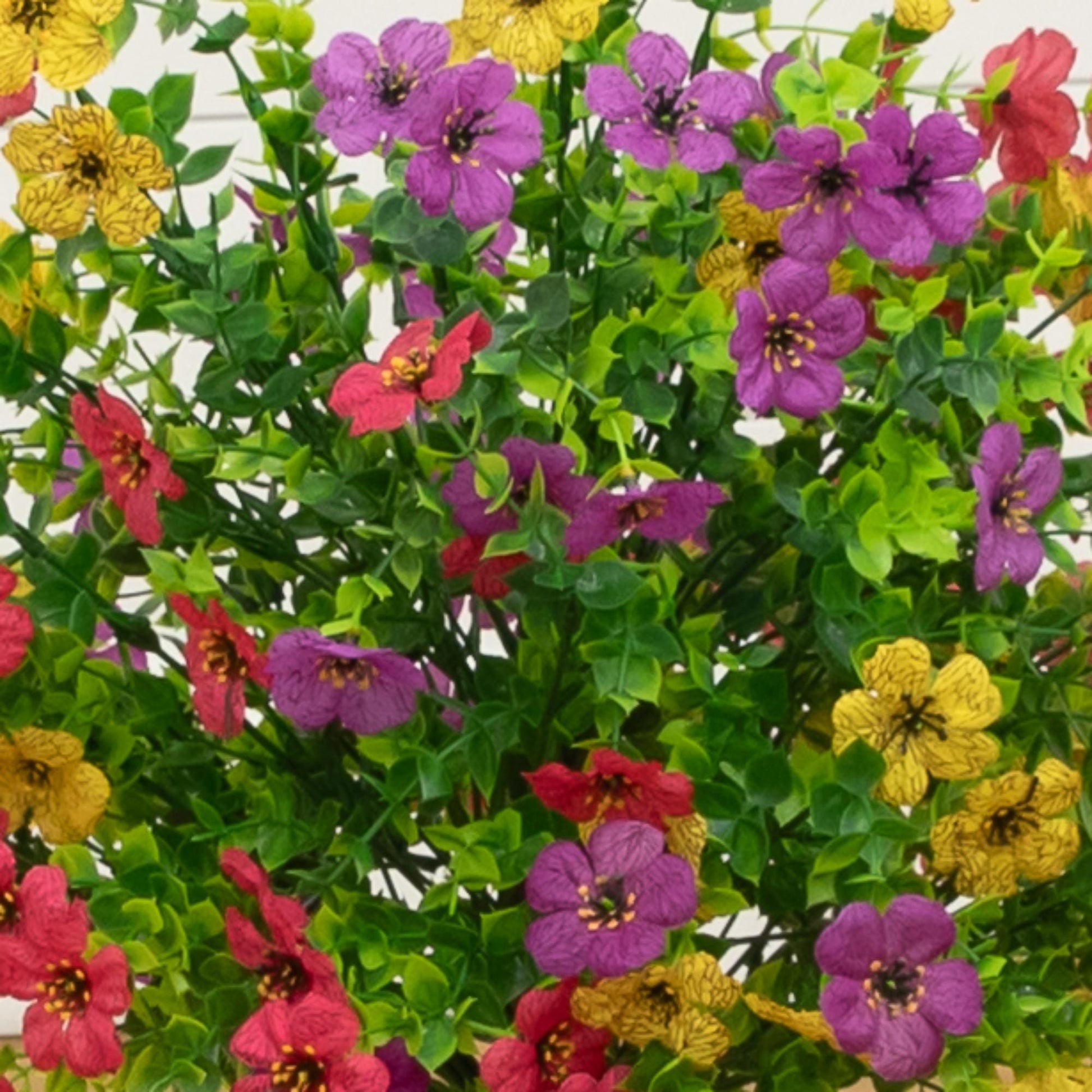 Set of 2 23-inch UV artificial daisy plants with integrated stake colorful blooms and foliage on Tampa Home & Garden Store