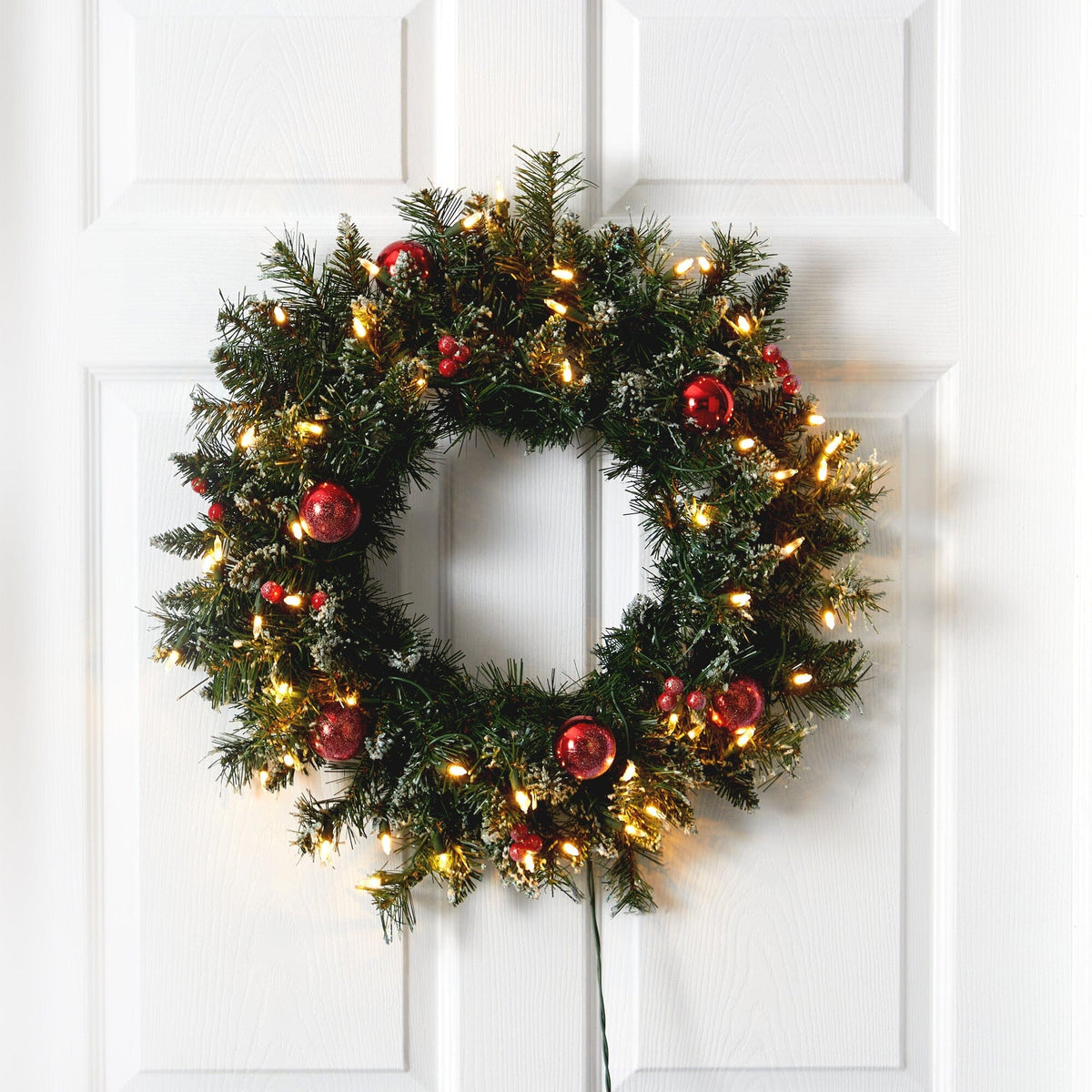 Wreath Nearly Natural 24” Frosted Christmas wreath with 50 LED lights and red ornaments on Tampa Home & Garden Store