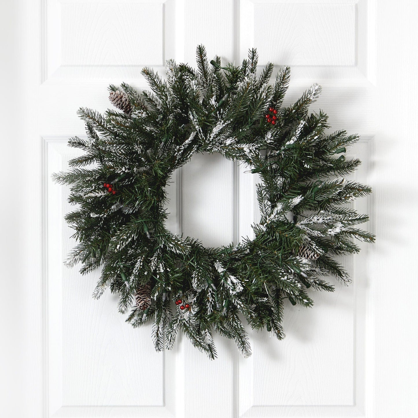 Nearly Natural 24-inch Snowed Artificial Christmas Wreath with 50 warm white LED lights and pine cones on Tampa Home & Garden Store