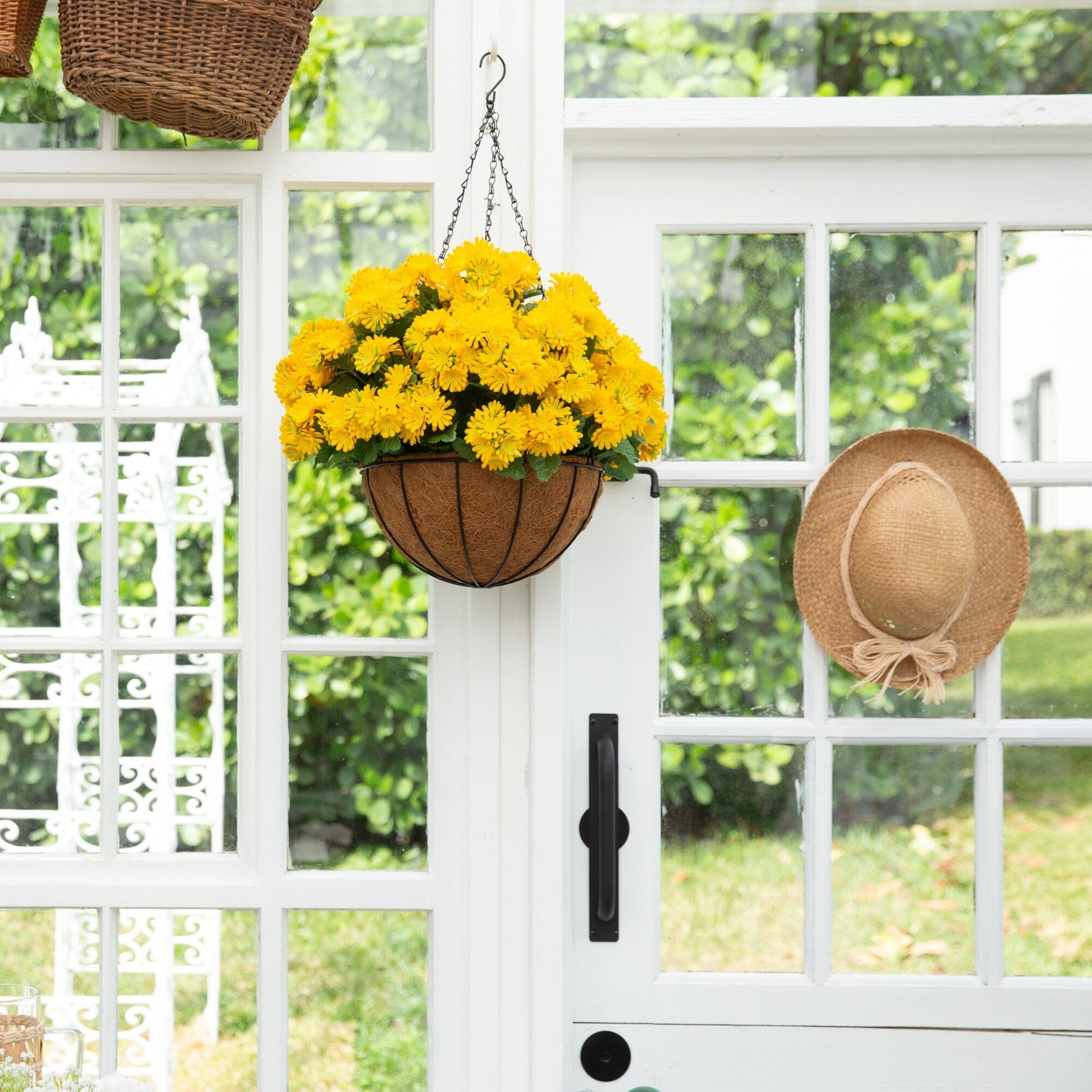 24in hanging basket with yellow chrysanthemums in brown wicker on Tampa Home & Garden Store