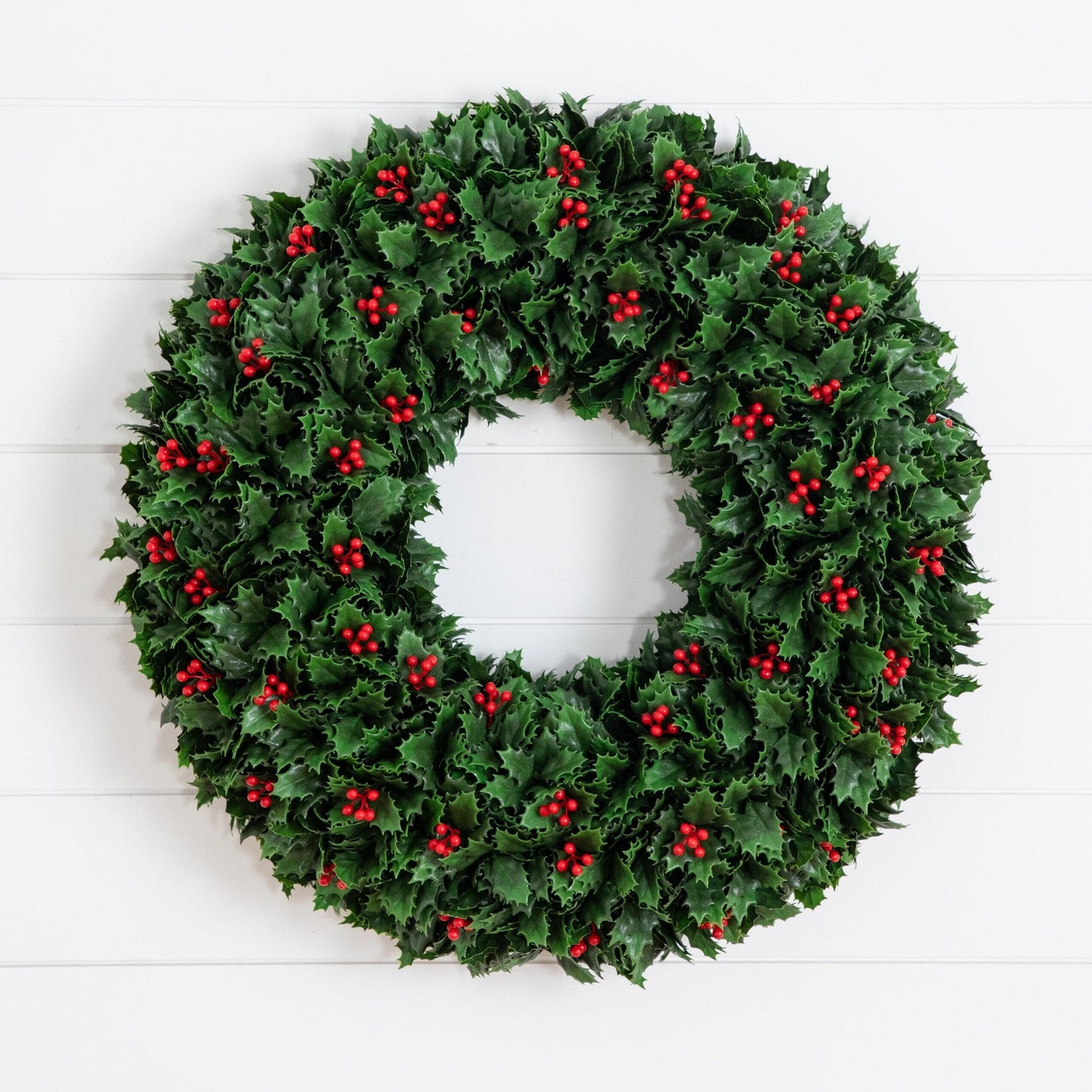 Nearly Natural 24-inch UV-resistant holly berry wreath with green leaves and red berries on Tampa Home & Garden Store