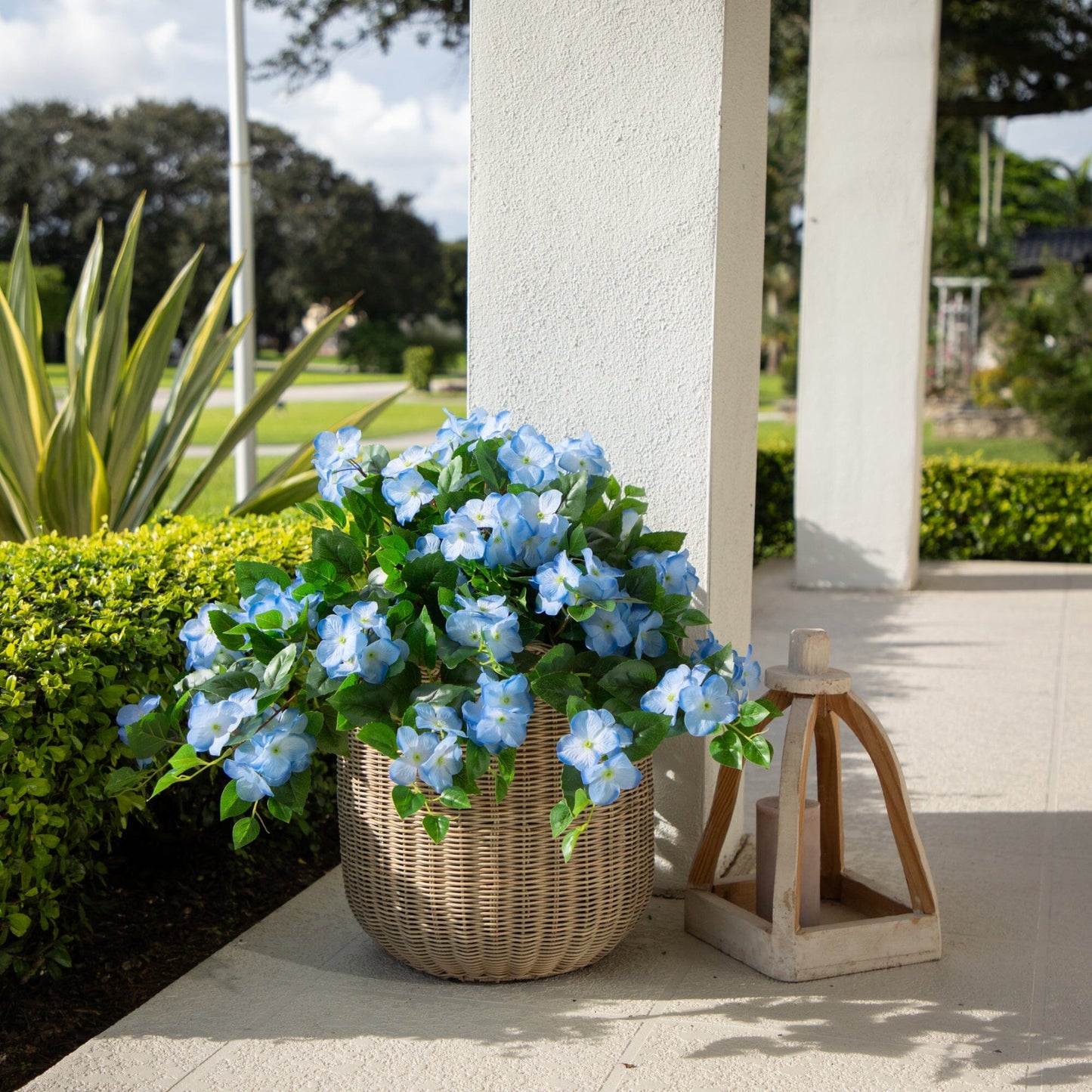 Nearly Natural 24in UV-resistant artificial hydrangea hanging plant blue blooms in wicker basket on Tampa Home & Garden Store