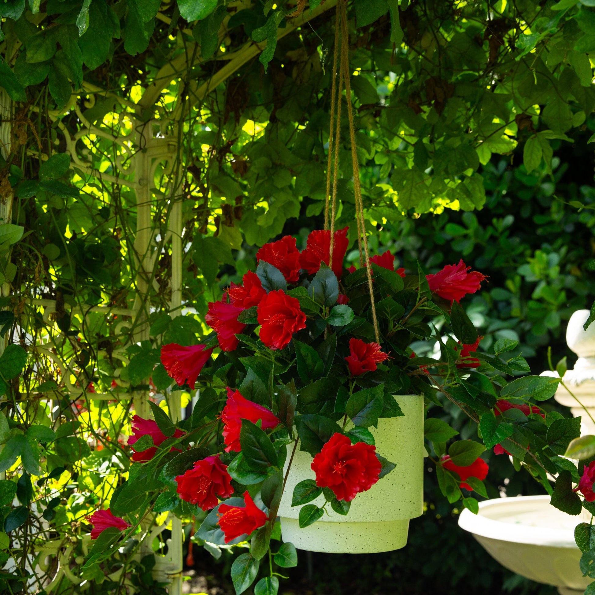 Red hibiscus hanging plant set of 2, UV resistant artificial blossoms with green leaves on Tampa Home & Garden Store