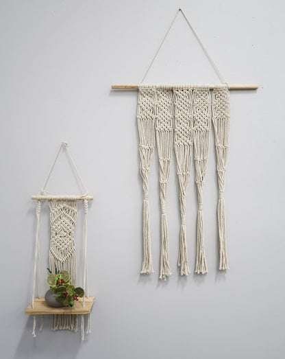 Two macrame wall hangings by Nearly Natural: large cream tassel knotwork wall piece and planter shelf on Tampa Home & Garden Store