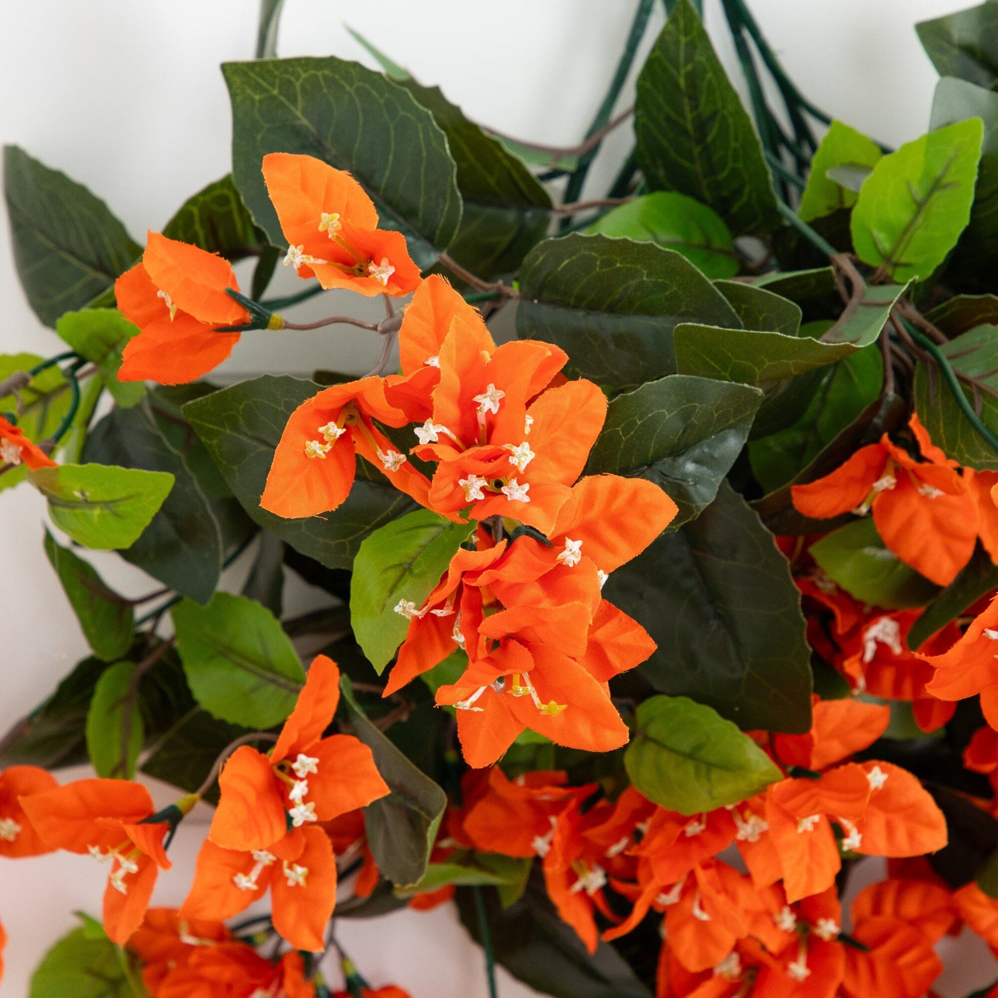 Nearly Natural 28in UV Bougainvillea Hanging Plant Set of 2, orange blooms and green leaves on Tampa Home & Garden Store