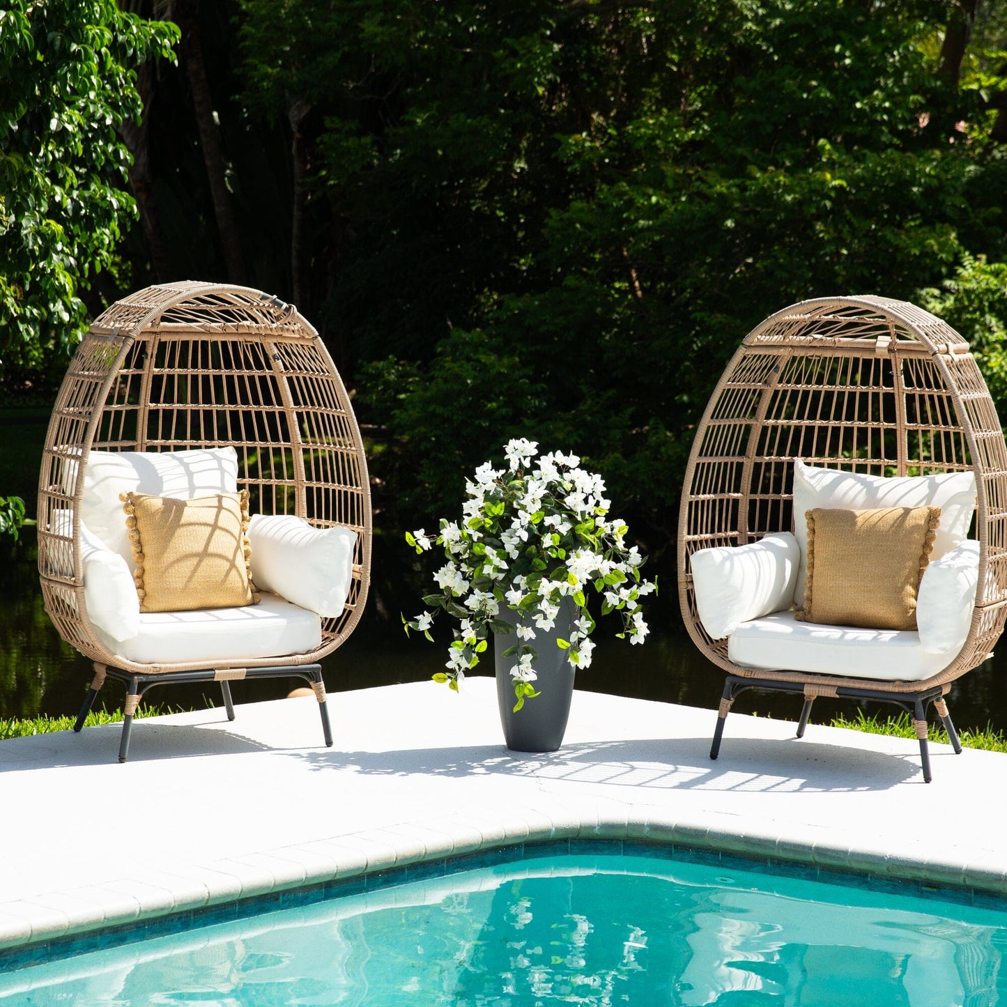 Nearly Natural 28” UV resistant bougainvillea hanging plant by pool with wicker chairs on Tampa Home & Garden Store