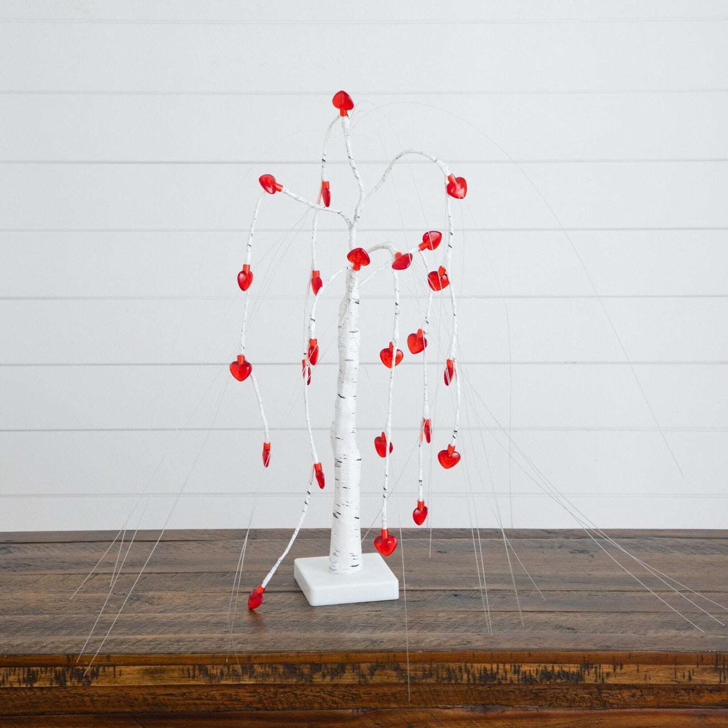 Nearly Natural 2' pre-lit Valentine willow tree with 24 red heart LED lights on white pedestal on Tampa Home & Garden Store
