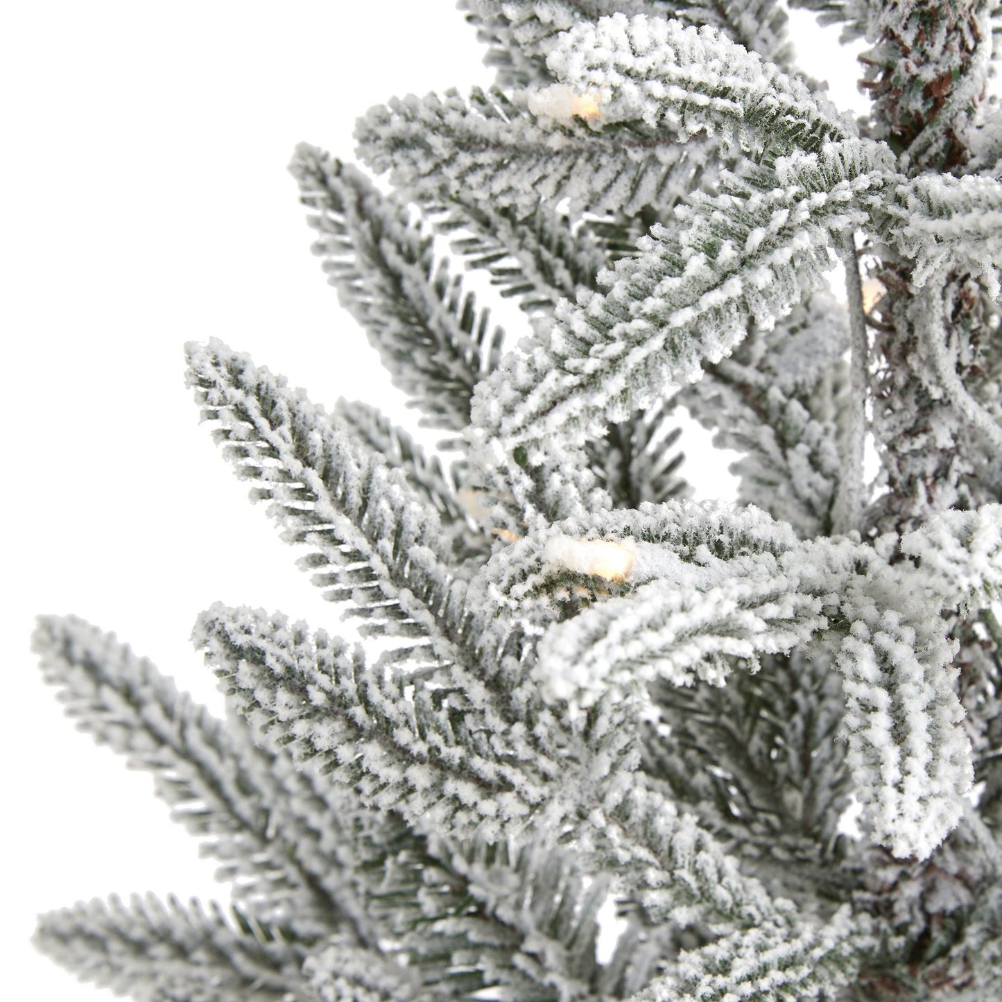 3 ft flocked Manchester Spruce artificial tree branch close-up covered in snow on Tampa Home & Garden Store