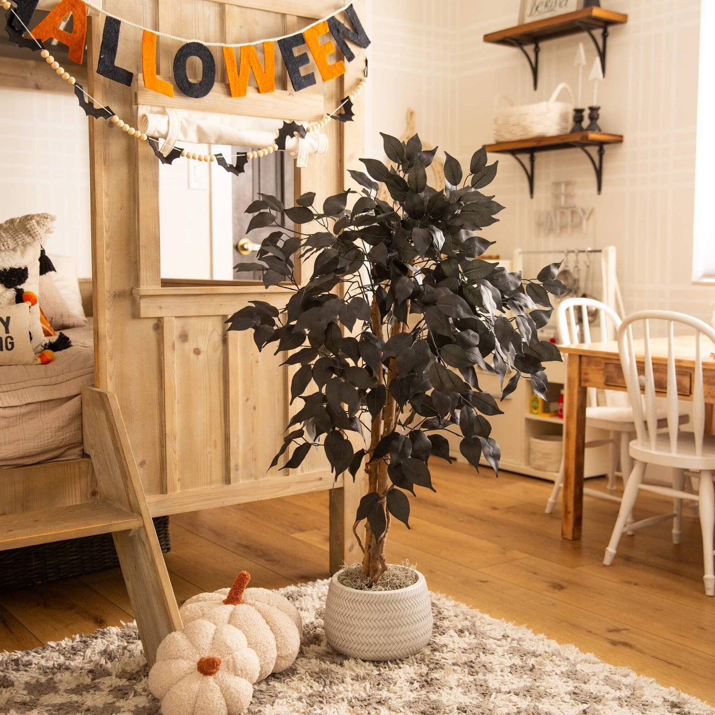 3' Artificial Halloween Black Ficus Tree with Natural Trunk by Nearly Natural, dark ficus leaves and natural trunk in a cozy room on Tampa Home & Garden Store