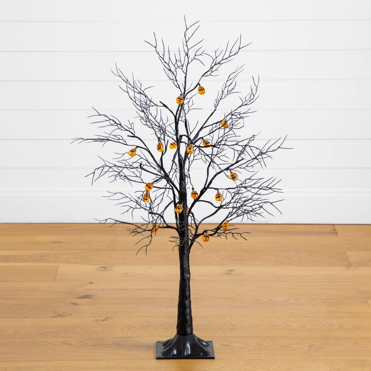 3ft pre-lit artificial Halloween black twig tree with 18 orange pumpkin-shaped LED lights on Tampa Home & Garden Store
