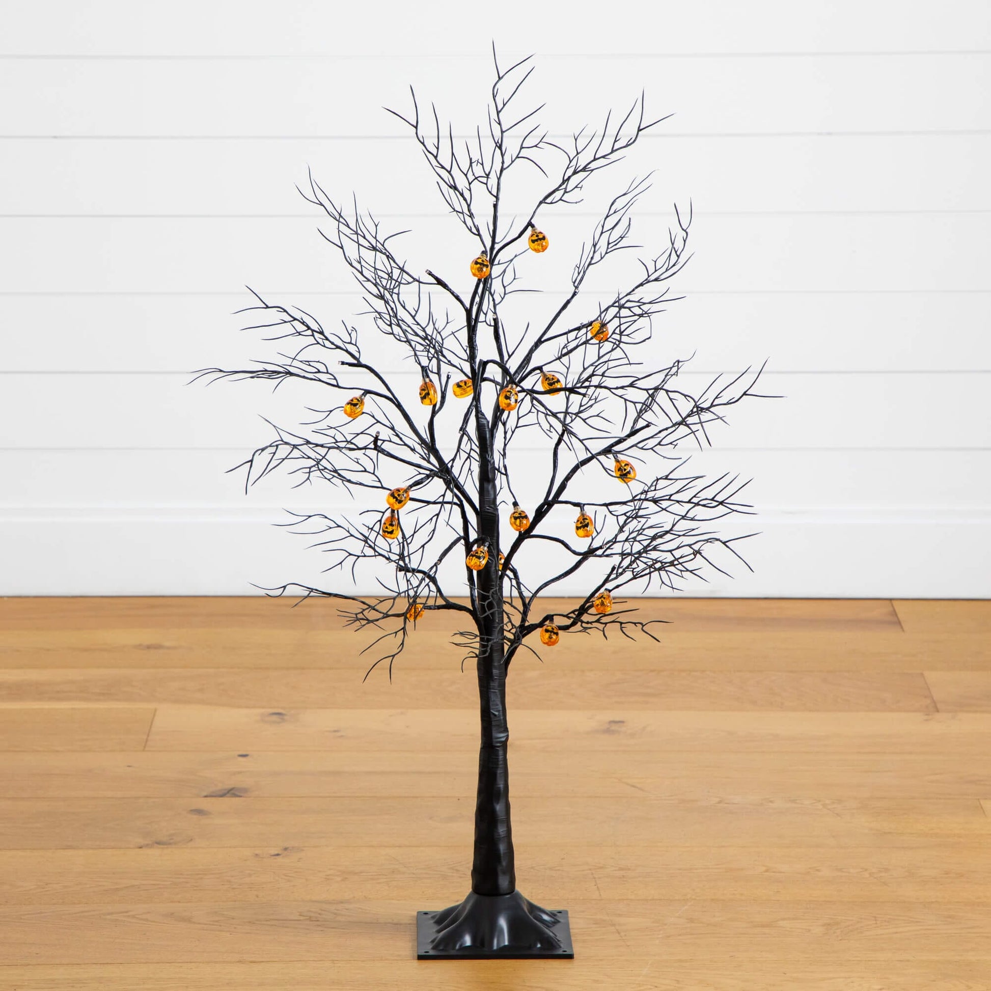 3ft pre-lit artificial Halloween black twig tree with 18 orange pumpkin-shaped LED lights on Tampa Home & Garden Store