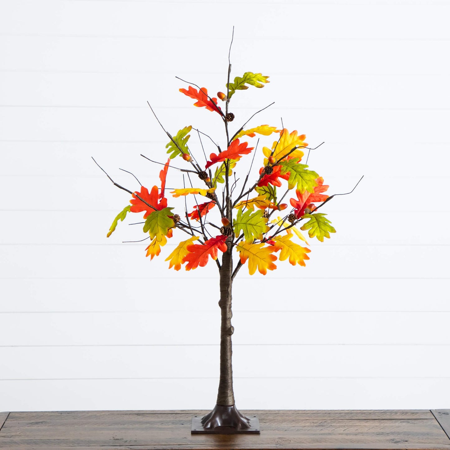 3' Pre-Lit Autumn Maple artificial fall tree with colorful leaves and pinecones on a dark base on Tampa Home & Garden Store