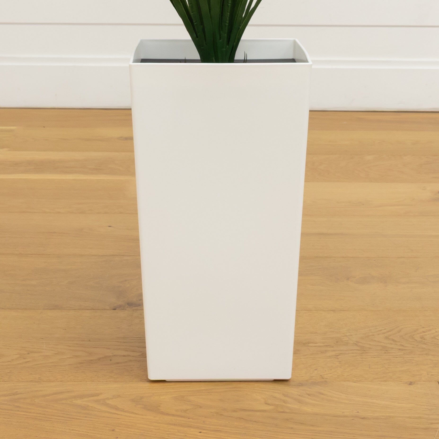 Nearly Natural 3 ft UV-resistant artificial grass plant in white tower planter Indoor/Outdoor on Tampa Home & Garden Store
