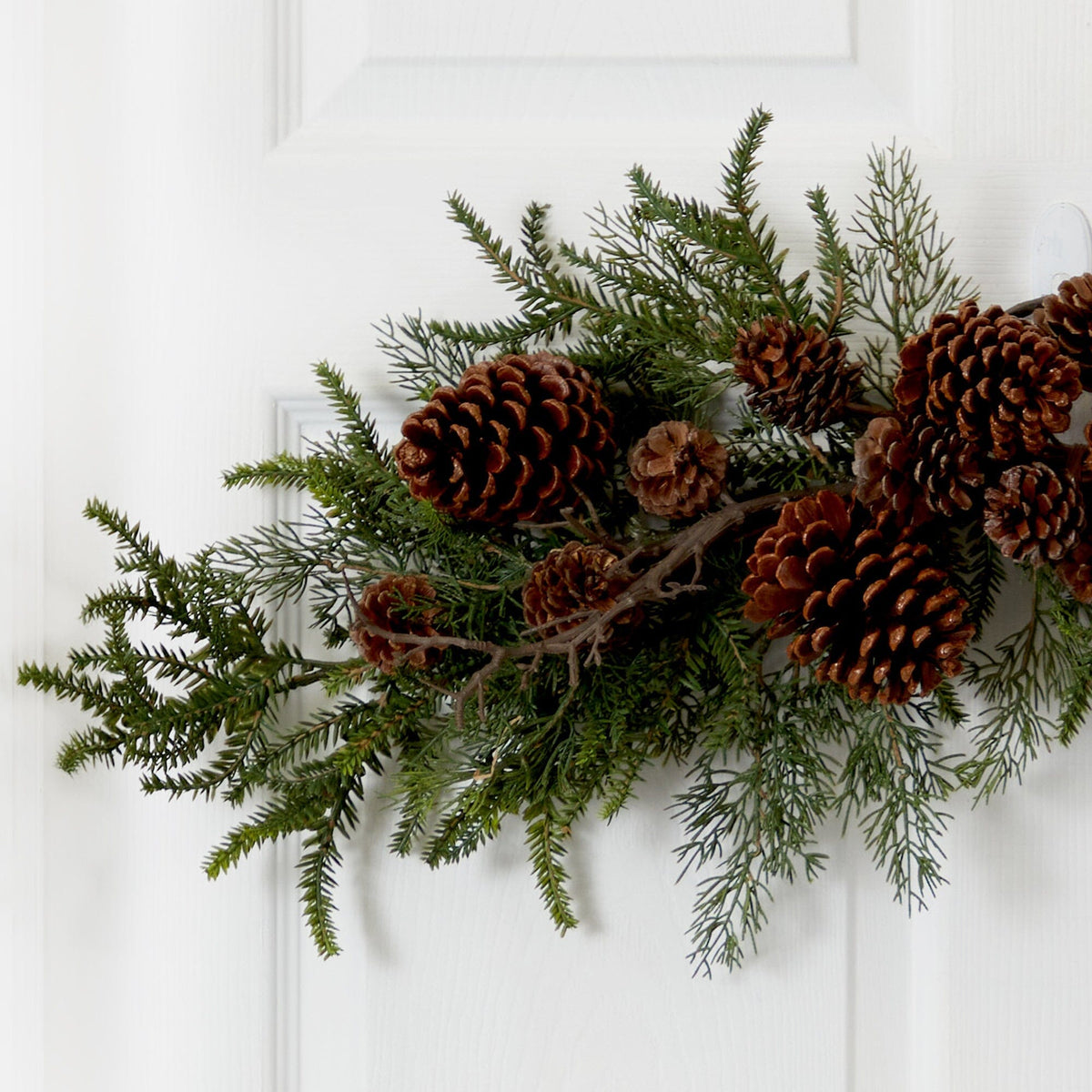 32in Artificial Pine & Pine Cone Swag by Nearly Natural with green needles and brown cones on Tampa Home & Garden Store