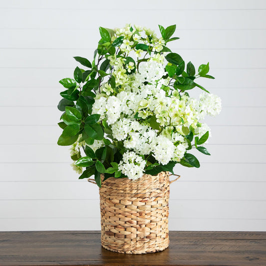 31-inch mixed flower arrangement in a hyacinth basket with white blooms and green leaves on Tampa Home & Garden Store