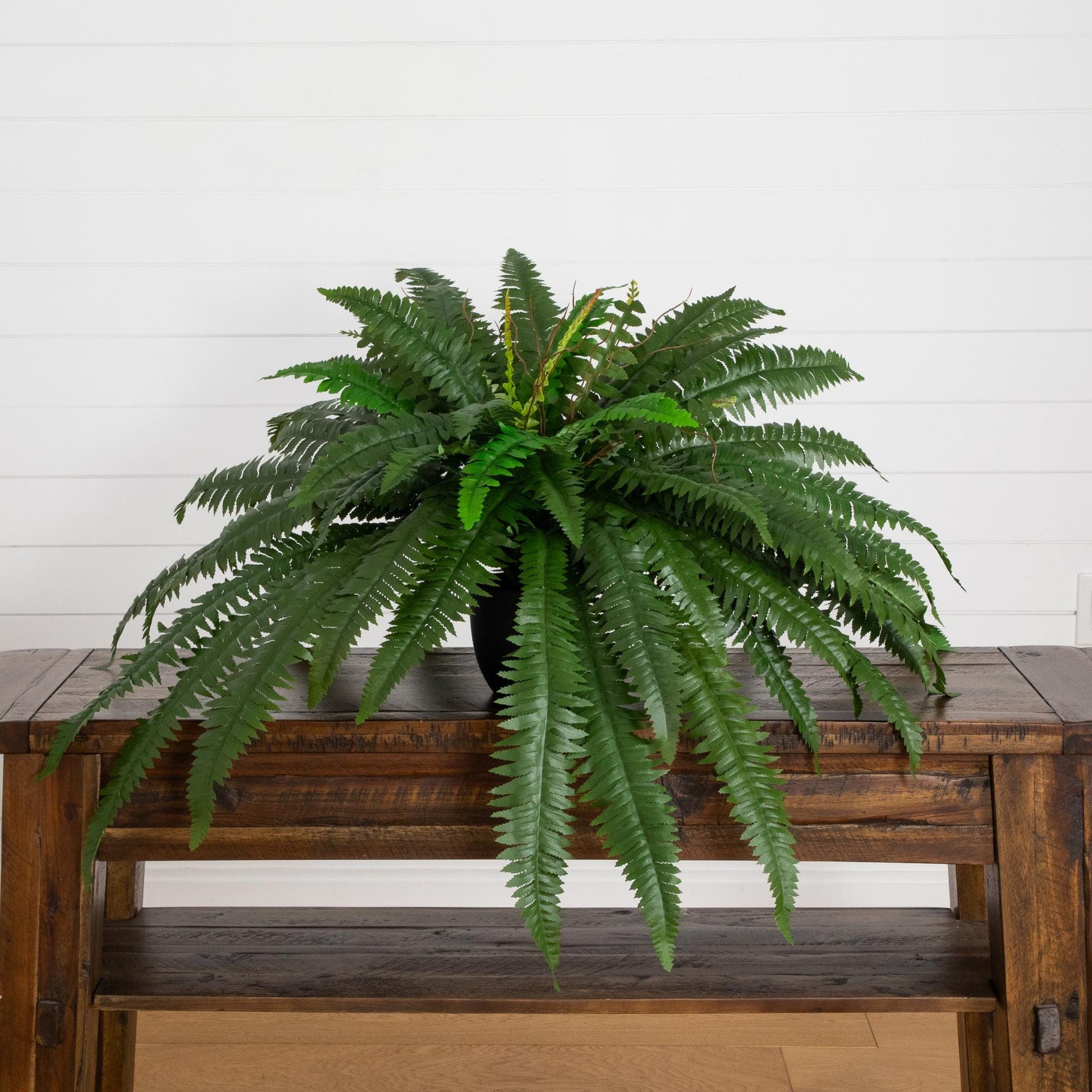32-inch artificial self-shaped Boston fern in black planter by Nearly Natural on Tampa Home & Garden Store