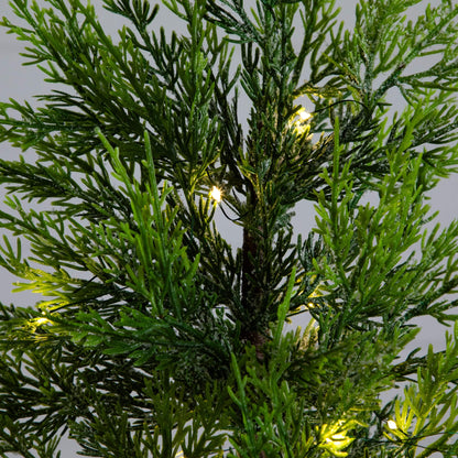 32in pre-lit artificial lightly snowed Cypress Christmas tree with 30 white LEDs in a basket on Tampa Home & Garden Store